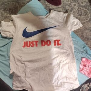 Nike Kids White Tee with Blue Swoosh and Red Text